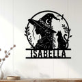 Wiccan witch and cat metal sign displayed as mystical wall decor in a bright home setting