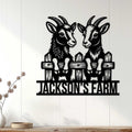 Black goat wall sign displayed on white wood paneling in a farmhouse-style room