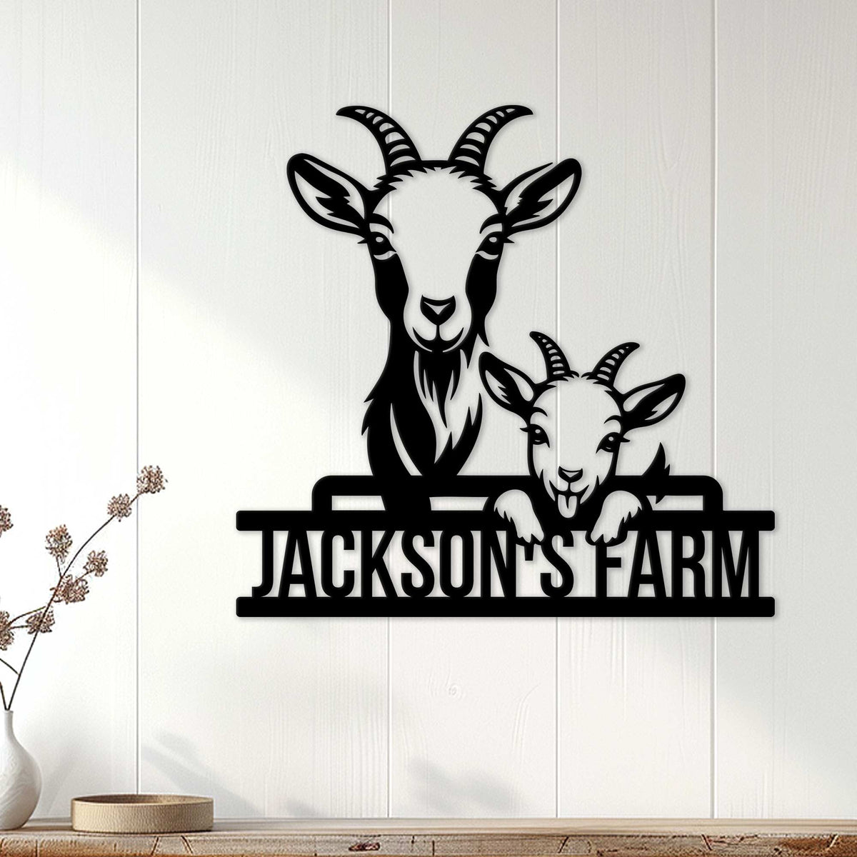 Black goat family metal sign displayed on a light farmhouse wall