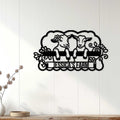 Rustic goat metal sign displayed on a white farmhouse wall above a wooden shelf