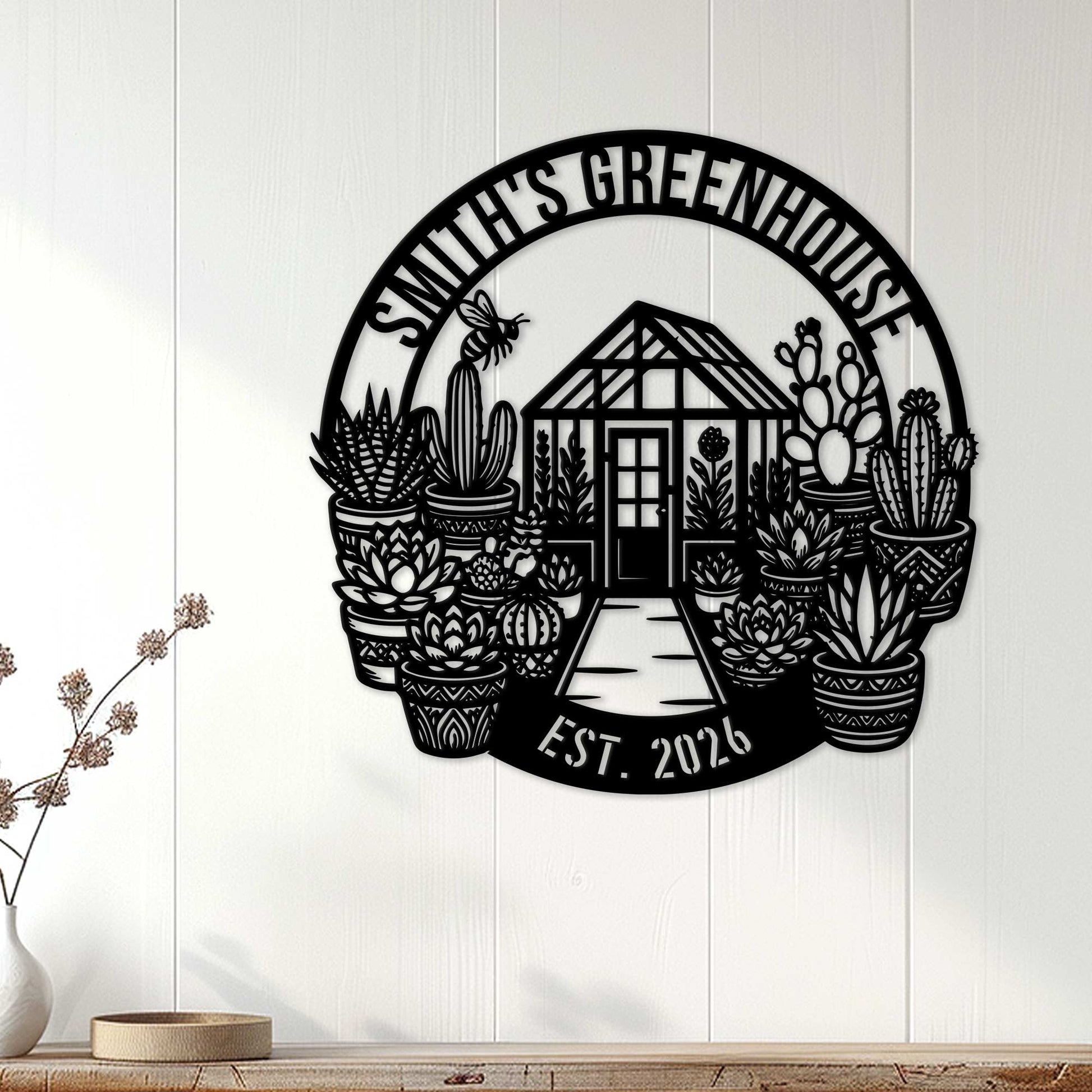 Greenhouse wall decor displayed on white paneling, surrounded by potted plants in a bright home setting
