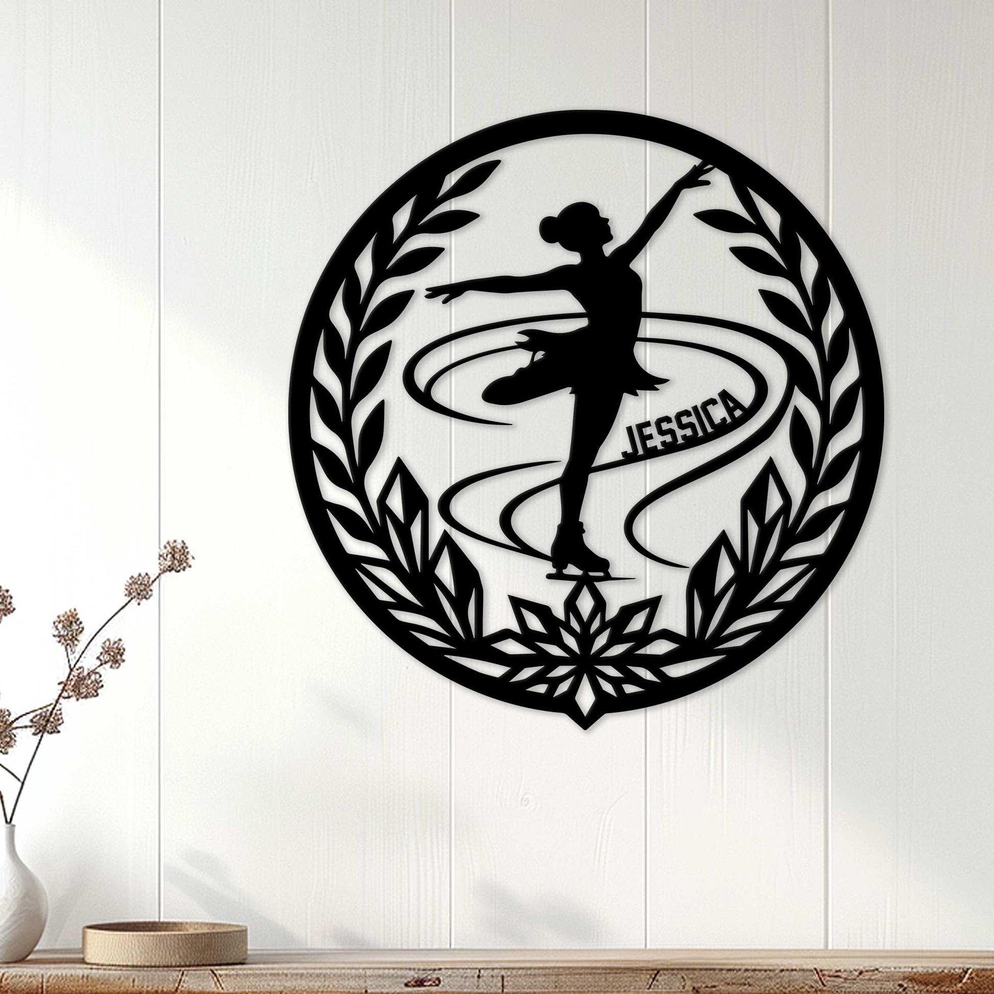 Black figure skater metal wall sign displayed on a light paneled wall as ice skating decor