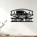 Ambulance wall decor displayed on a light wood wall, featuring an emergency vehicle and heartbeat graphic