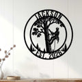 Arborist metal sign displayed as tree climber wall decor on a light wood-paneled wall