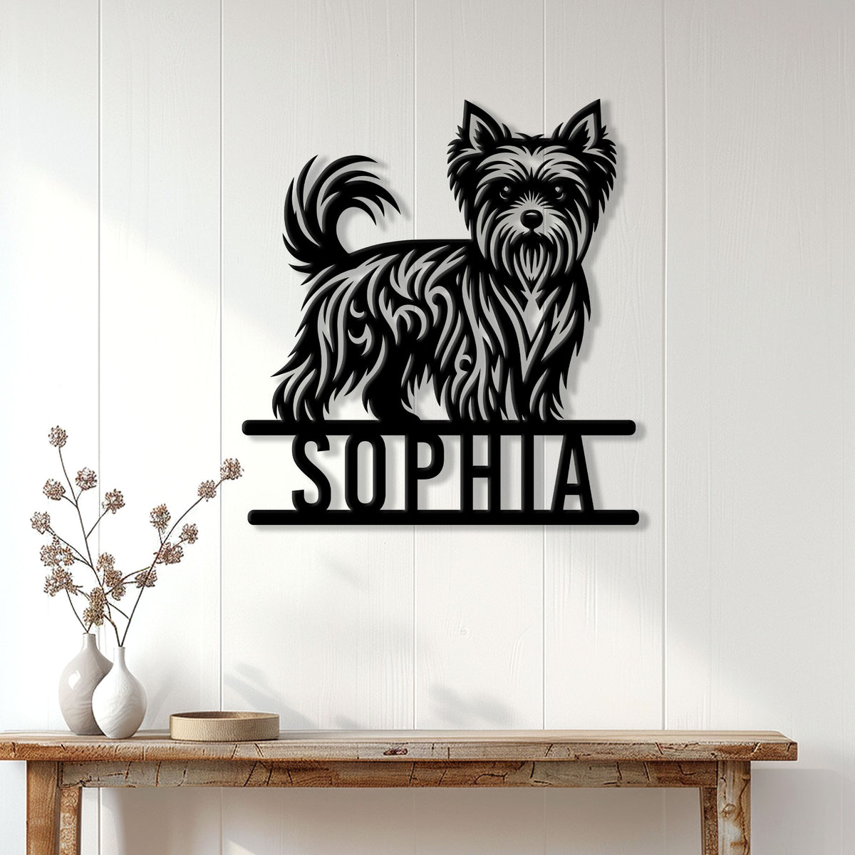 Yorkie metal wall sign displayed above a wood console in a bright, modern home entryway
