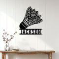 Badminton shuttlecock wall sign displayed on a bright paneled wall above a console table