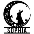 Floral rabbit silhouette inside a crescent moon on a custom metal sign for bunny lovers
