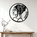 Book lover metal wall sign displayed above a wood console in a bright reading-inspired home interior