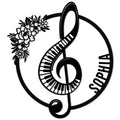 Custom piano metal sign featuring a treble clef formed from piano keys and a floral accent
