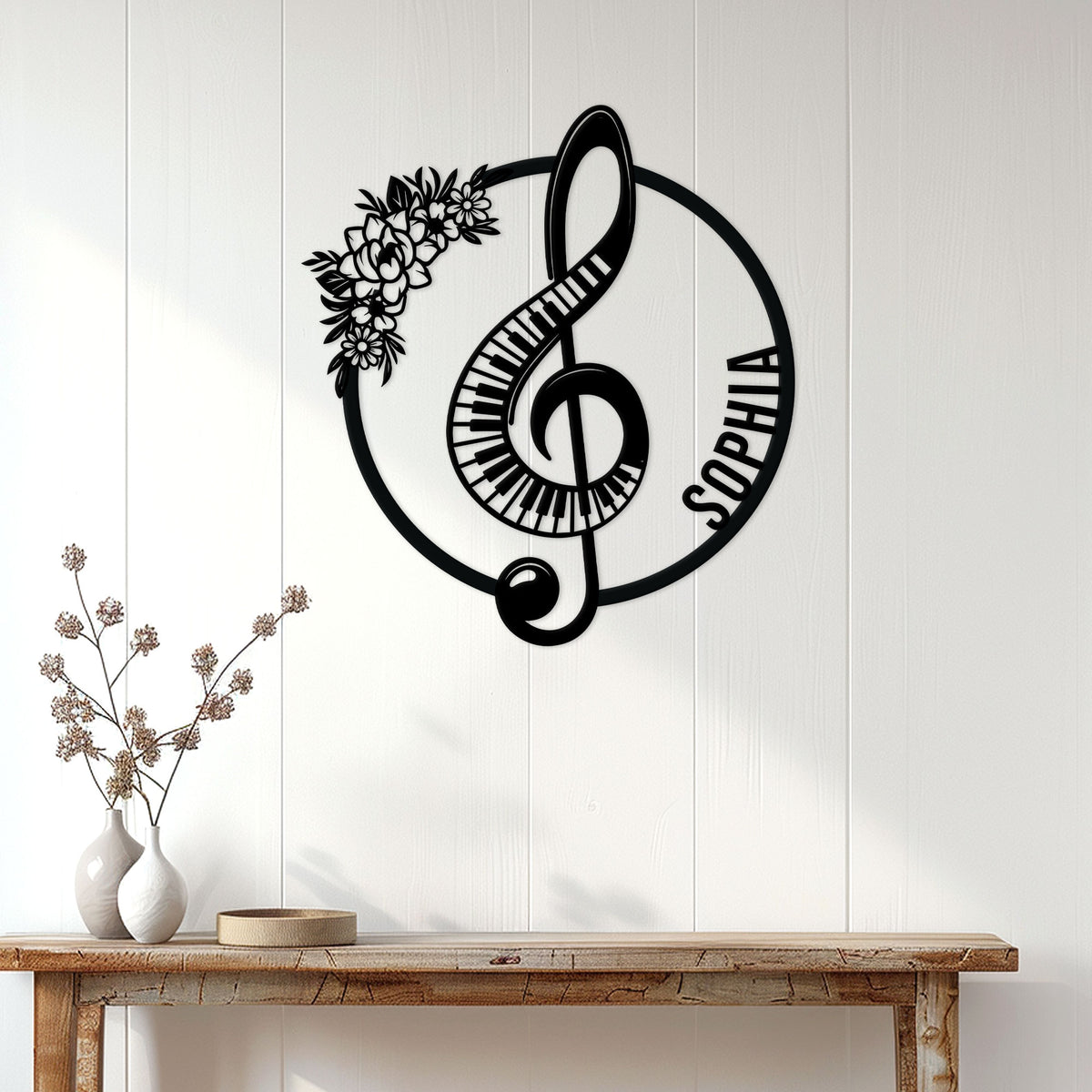 Piano wall decor displayed on a white paneled wall above a console table