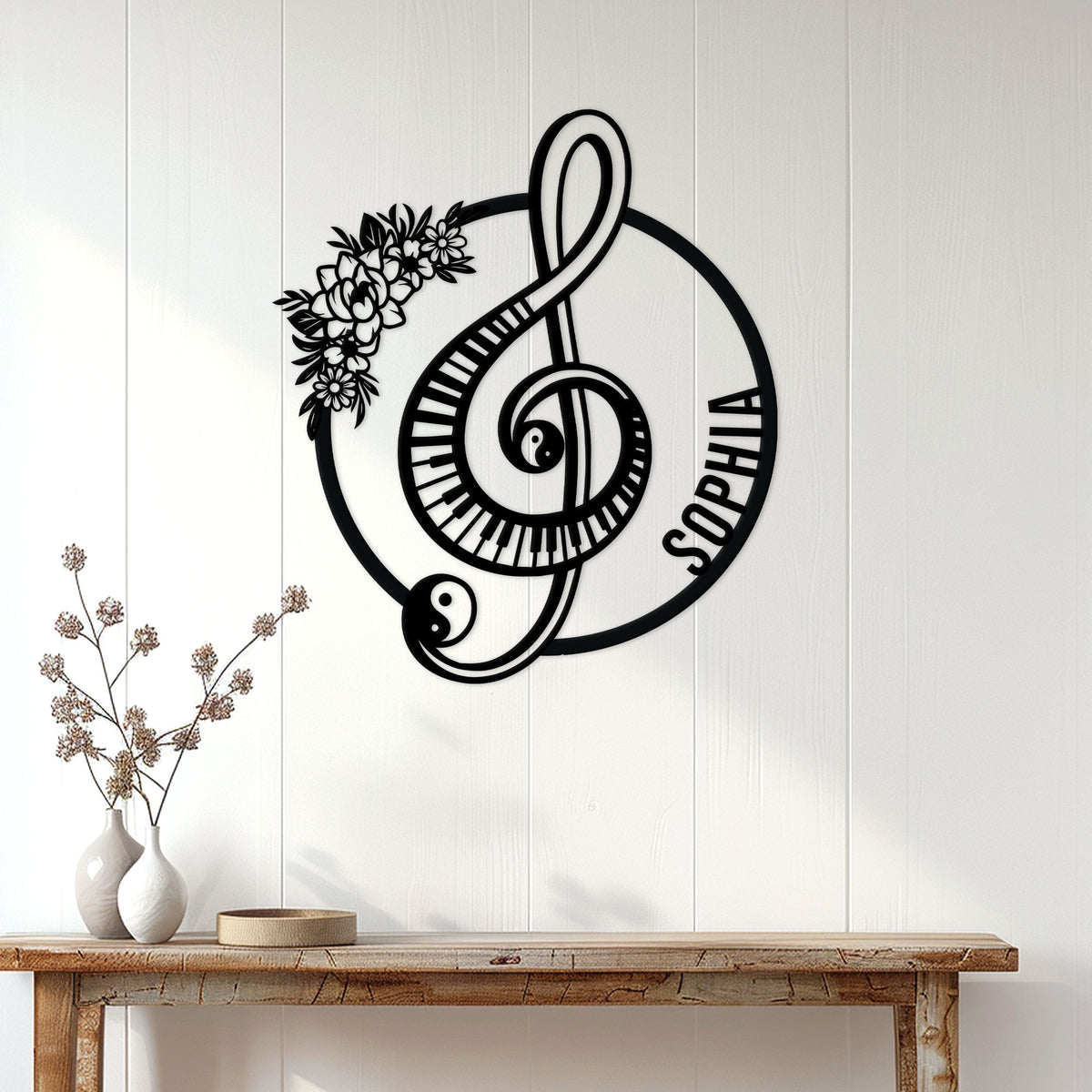 Piano wall decor displayed on a white paneled wall above a console table in a bright home interior