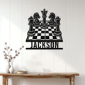 Chess wall decor displayed above a console table, featuring a dramatic king, queen, knights, and chessboard