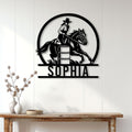 Barrel racing metal wall sign displayed on a bright paneled wall above a rustic console table
