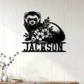 Ferret metal wall sign displayed on a light paneled wall above a console table