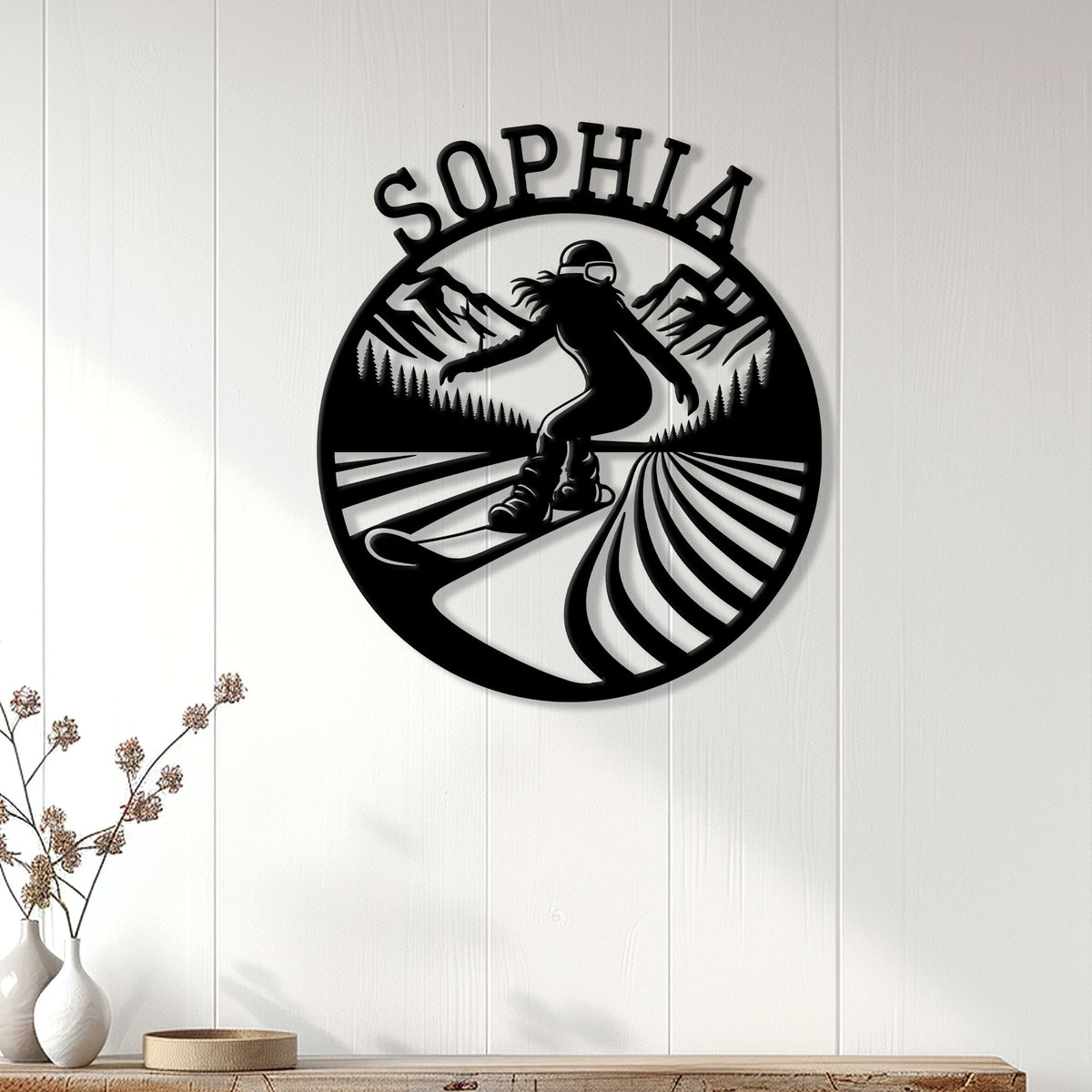 Snowboarder wall sign displayed on a white paneled wall above a console table in a modern room