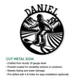 Snowboarder metal sign shown with a mountain scene, radiating trail lines, and circular cut design