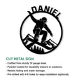 Snowboarding cut metal sign shown with a bold rider silhouette, mountain scenery, and circular border
