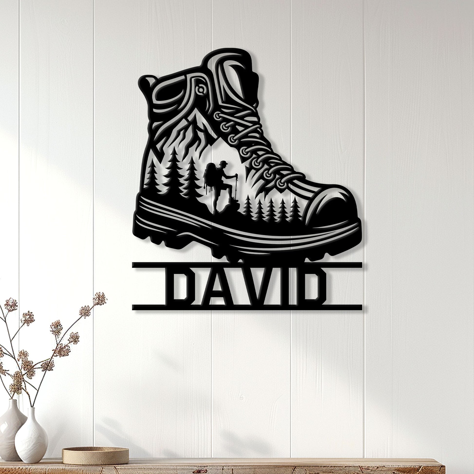 Hiking boot wall sign displayed on white paneling as rustic outdoor-inspired home decor