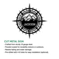 Mountain hiking compass metal sign shown in a cut-metal product feature presentation