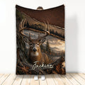 Rustic deer throw blanket featuring a buck in a mountain forest landscape with earthy woodland tones