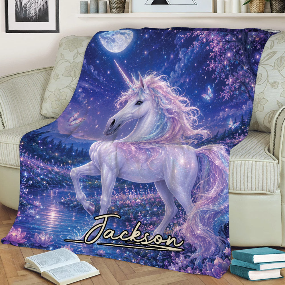 Close lifestyle view of a unicorn blanket featuring a lavender mane, starry sky, lake, and lotus flowers
