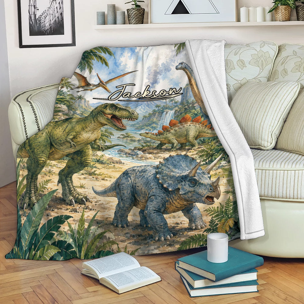 Dinosaur blanket draped over a sofa with colorful prehistoric artwork and tropical jungle scenery