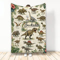 Dinosaur throw blanket with illustrated prehistoric species, tropical leaves, and vintage natural history artwork