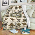 Dinosaur blanket styled on a sofa with colorful prehistoric species, jungle foliage, and a cozy living room setting