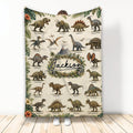 Dinosaur throw blanket displayed upright with illustrated dinosaurs, tropical leaves, volcano scenery, and custom central design