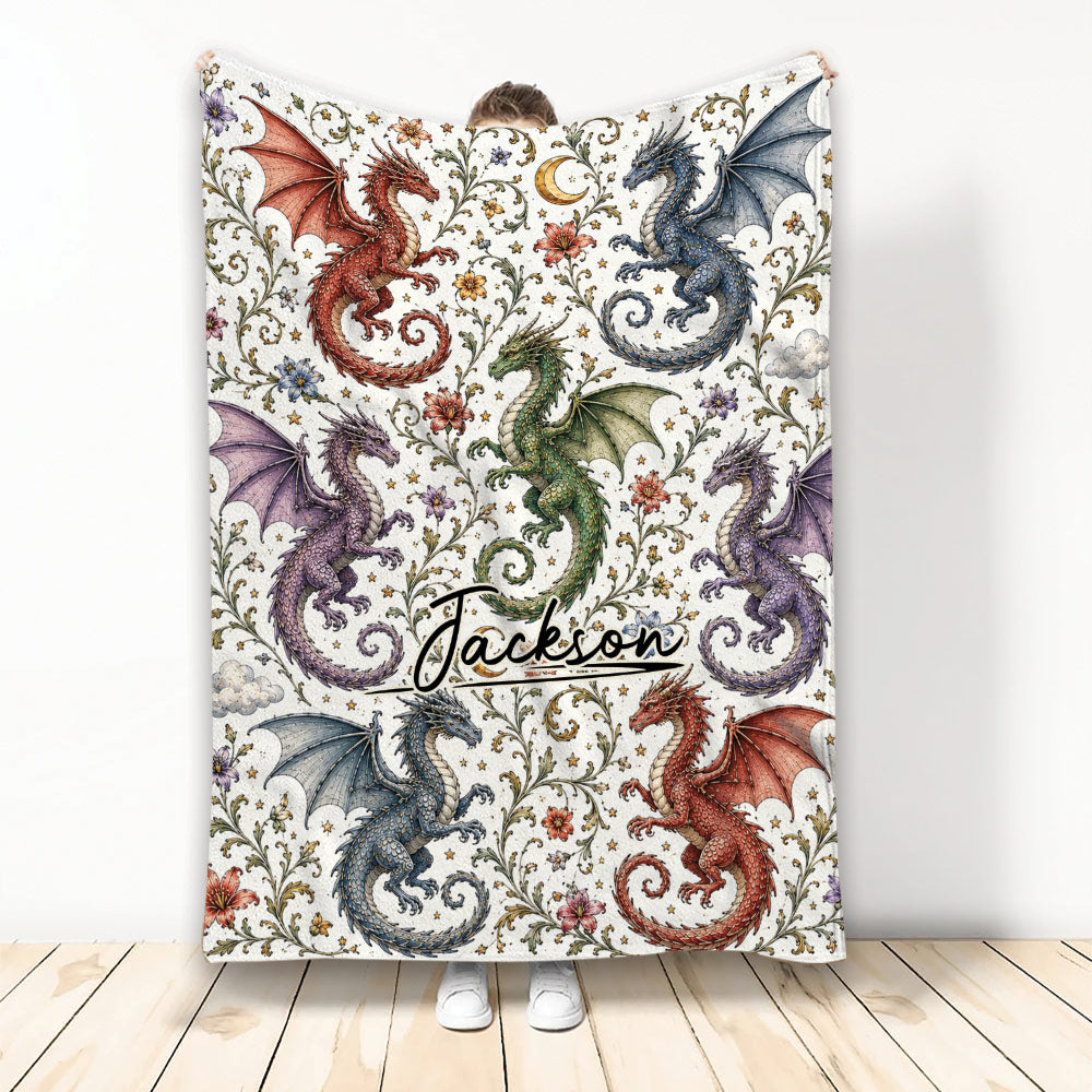 Dragon throw blanket displayed upright with colorful red, blue, green, and purple dragons on a floral fantasy pattern