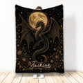 Dragon throw blanket with a black and gold winged dragon beneath a moon and starry sky