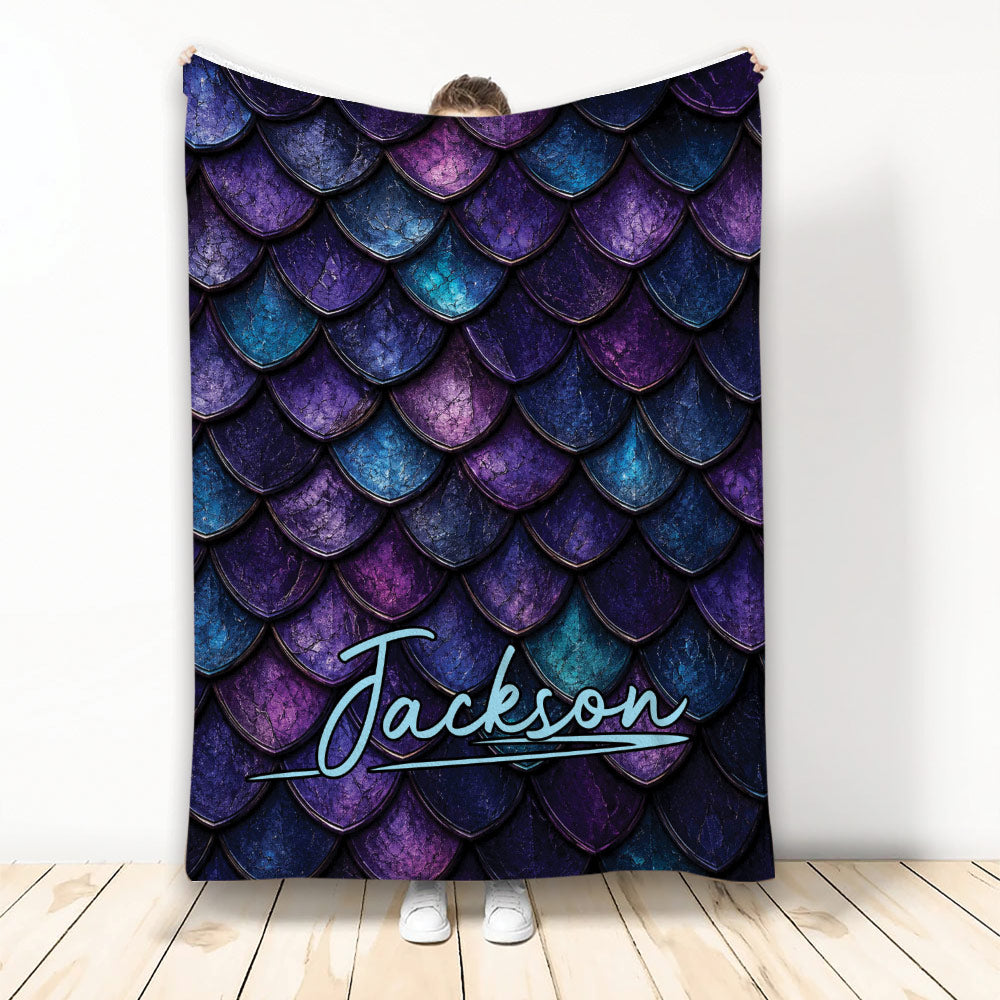 Dragon scale throw blanket displayed in purple, blue, and teal fantasy artwork