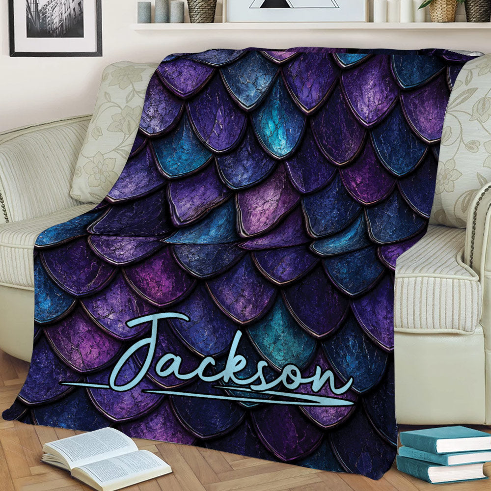 Dragon scale throw blanket styled across a sofa in jewel-toned fantasy colors
