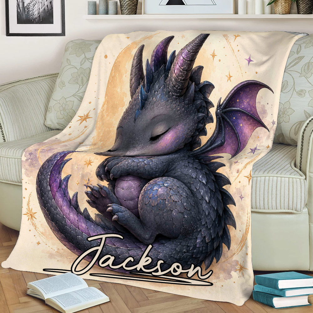 Close view of a dragon throw blanket displaying a curled purple and blue dragon in a dreamy starry scene
