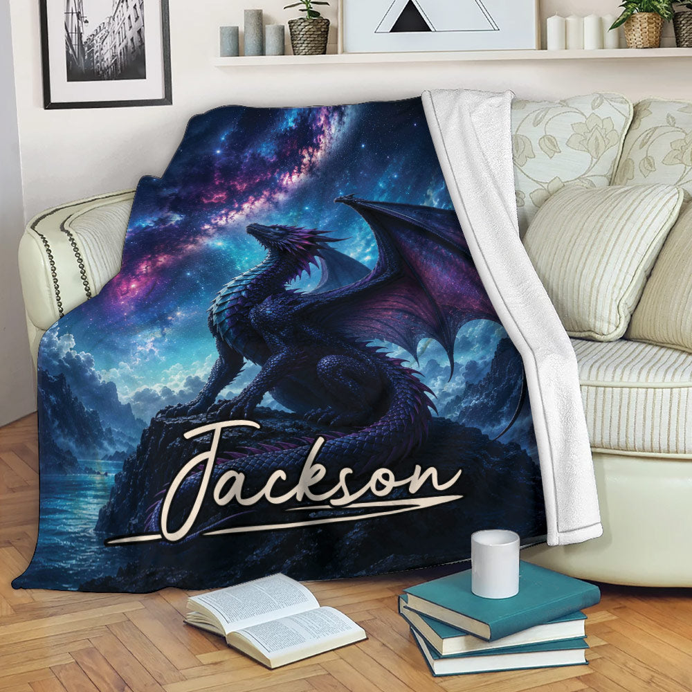 Cosmic dragon blanket draped over a sofa with vivid blue, purple and pink fantasy artwork