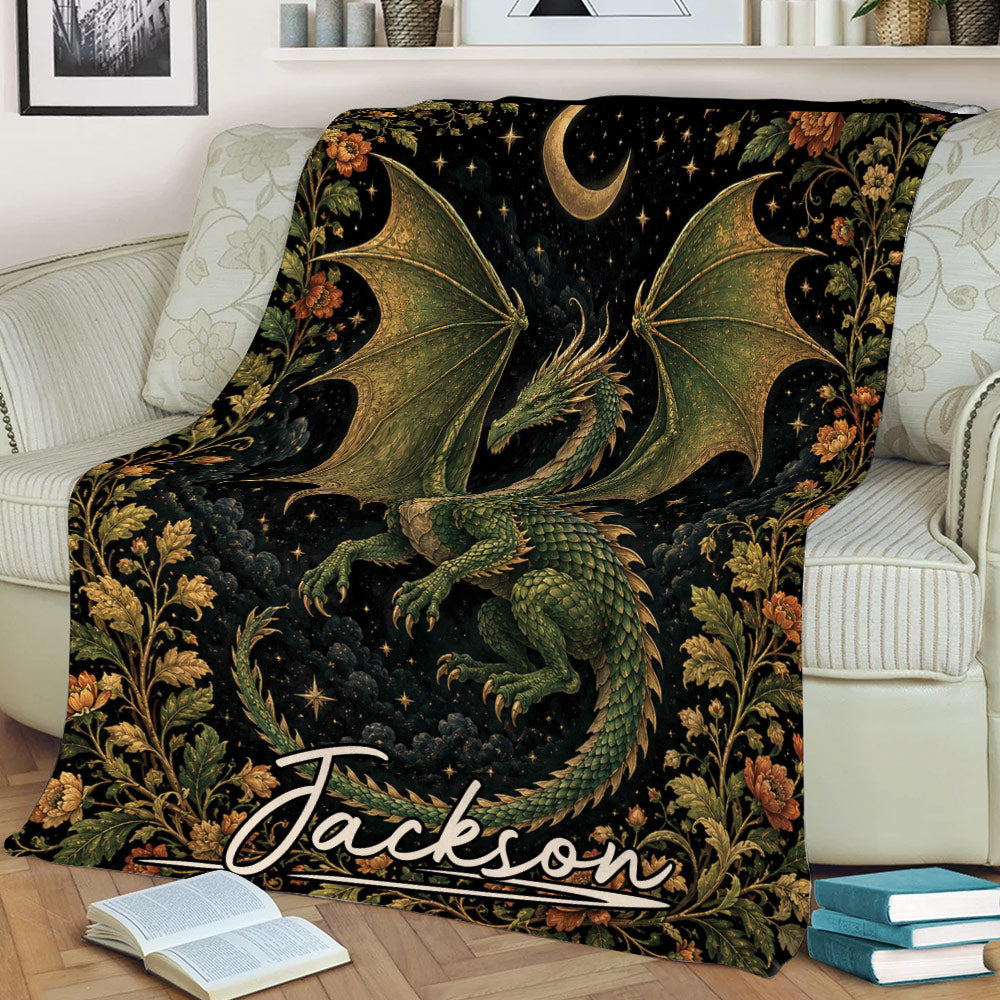 Fantasy dragon blanket draped across a sofa with moonlit floral artwork