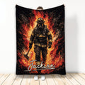 Firefighter blanket featuring a fully geared firefighter with an axe surrounded by dramatic red and orange flames