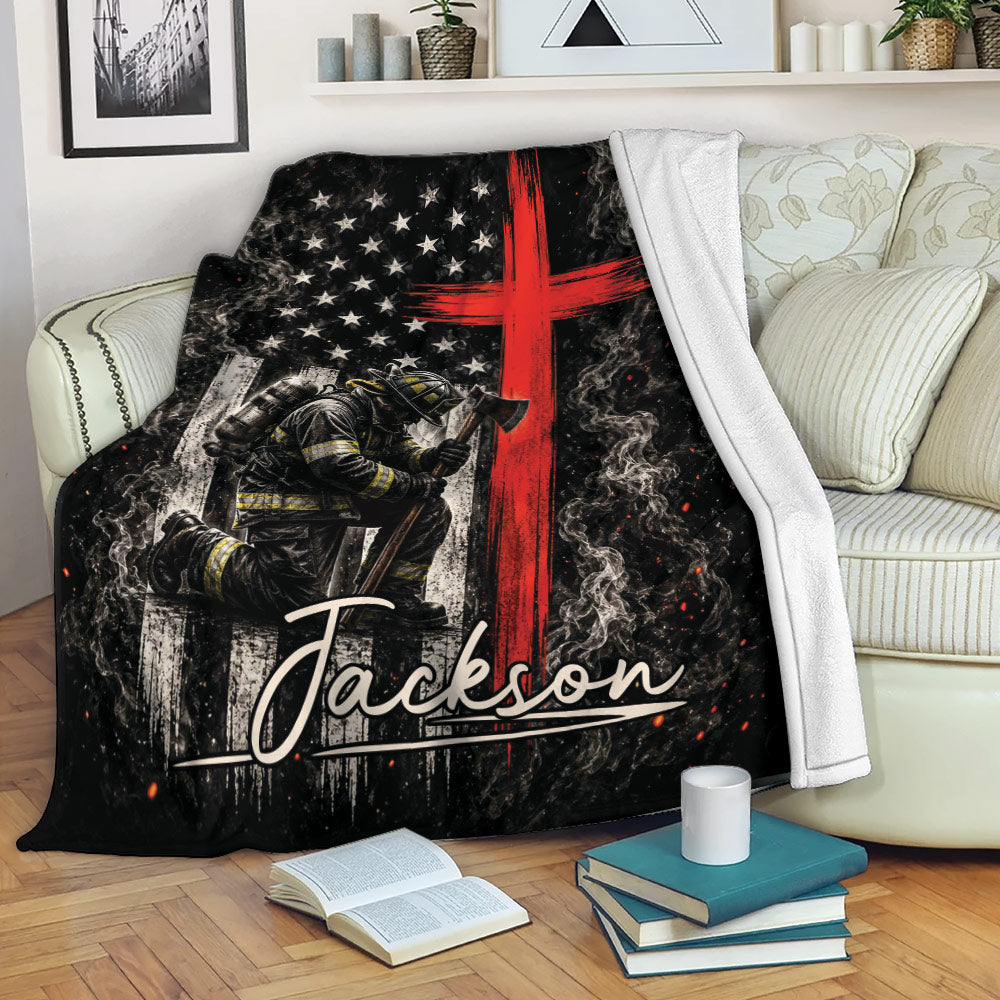Firefighter blanket displayed on a living room couch with dramatic smoky artwork and patriotic-inspired red and white design