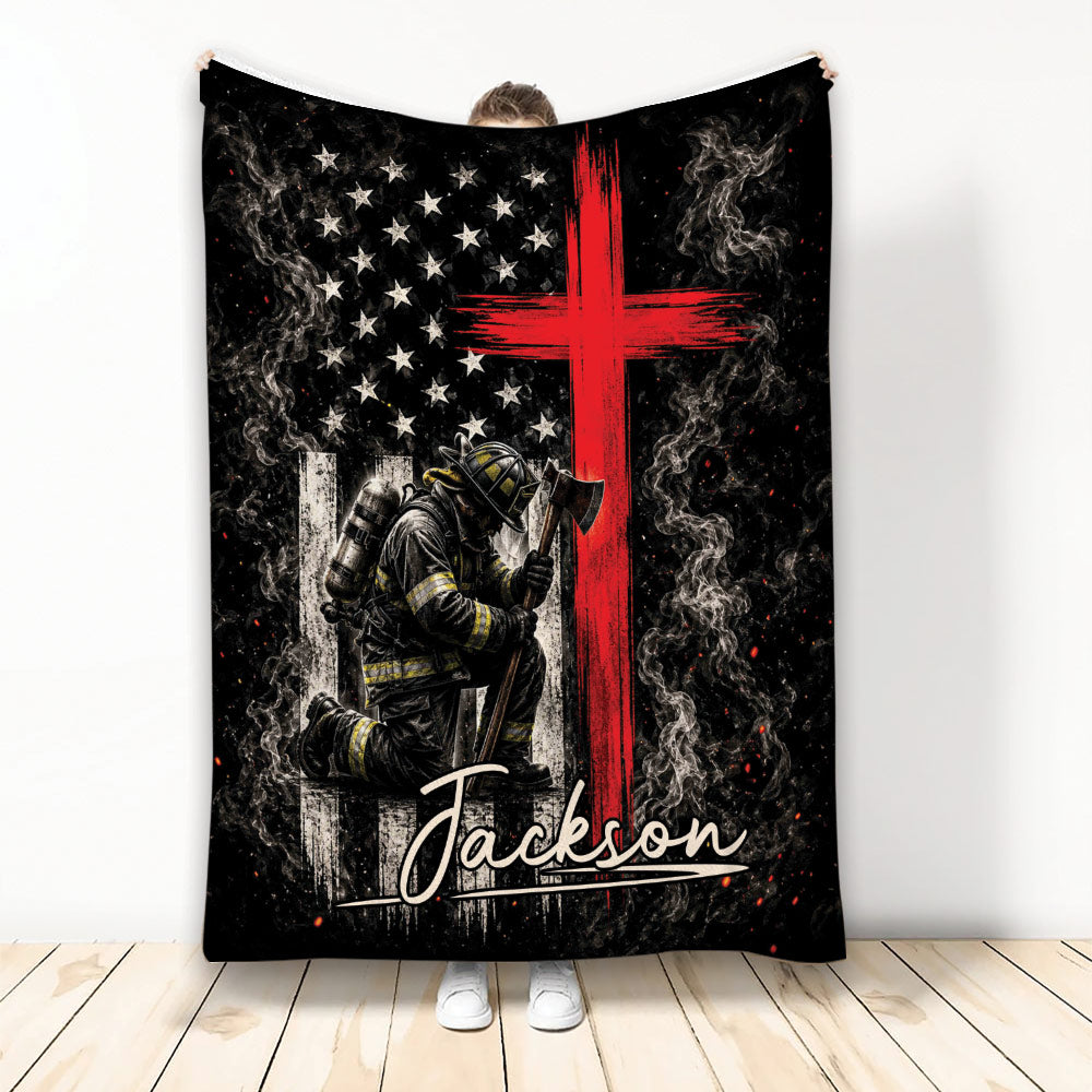 Firefighter throw blanket with kneeling firefighter artwork, smoky black background, stars, and bold red cross