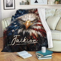 Bald eagle throw blanket displayed across a sofa with bold red, white, and blue patriotic design