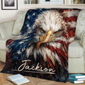 Patriotic eagle blanket draped over a couch, featuring detailed feathers and American flag colors