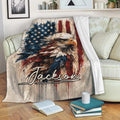 Patriotic bald eagle throw blanket displayed on a sofa with American flag artwork