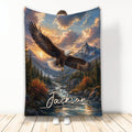 Bald eagle flying over a mountain valley and river in a dramatic sunset landscape blanket design