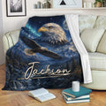 Eagle throw blanket displayed on a sofa with mountain scenery, moonlight, and dramatic wildlife artwork
