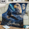 Close lifestyle view of an eagle throw blanket with soaring eagle, snowy mountains, moon, and forest scene