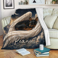 Miniature Pinscher throw blanket displayed on a sofa with celestial angel wings, clouds, stars, and moon artwork