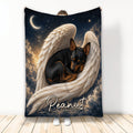 Miniature Pinscher blanket featuring a sleeping black-and-tan dog nestled in angel wings beneath a starry moonlit sky