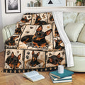 Miniature Pinscher blanket draped over a sofa with black-and-tan dog artwork and paw print details
