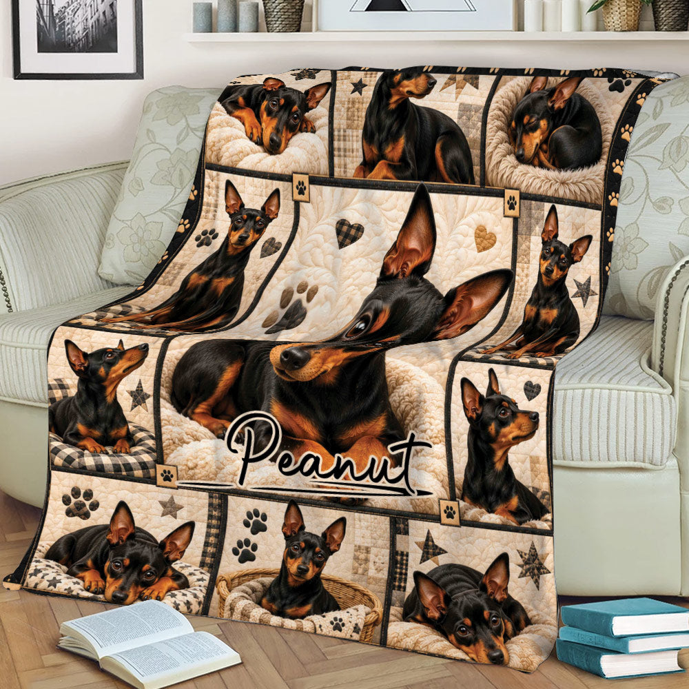 Close view of a Miniature Pinscher throw blanket displayed on a sofa with cozy dog collage artwork