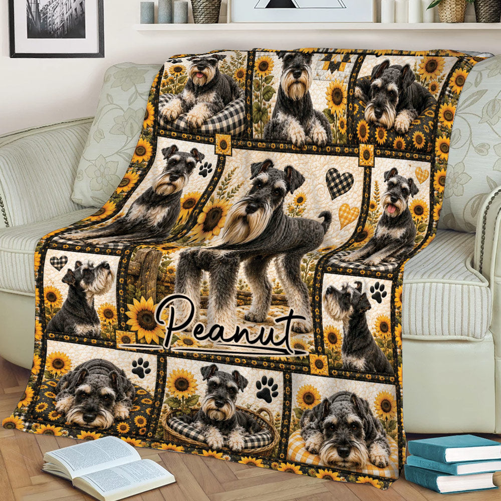 Miniature Schnauzer blanket displayed on a couch with sunflower panels and black and cream dog artwork